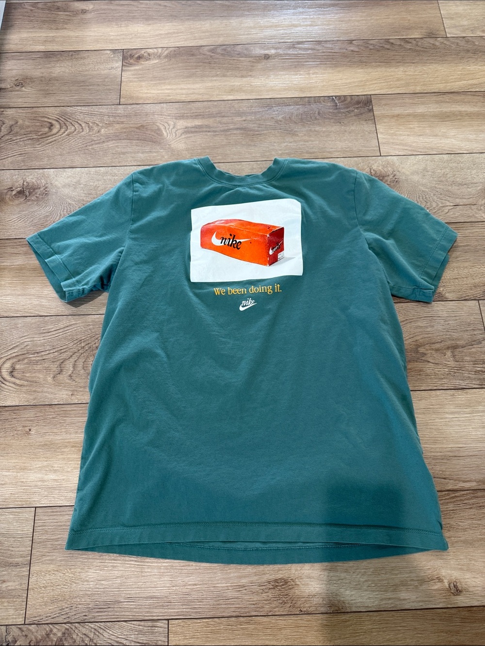 Nike Teal Short Sleeve Tee with Orange Shoebox Graphic - size Large